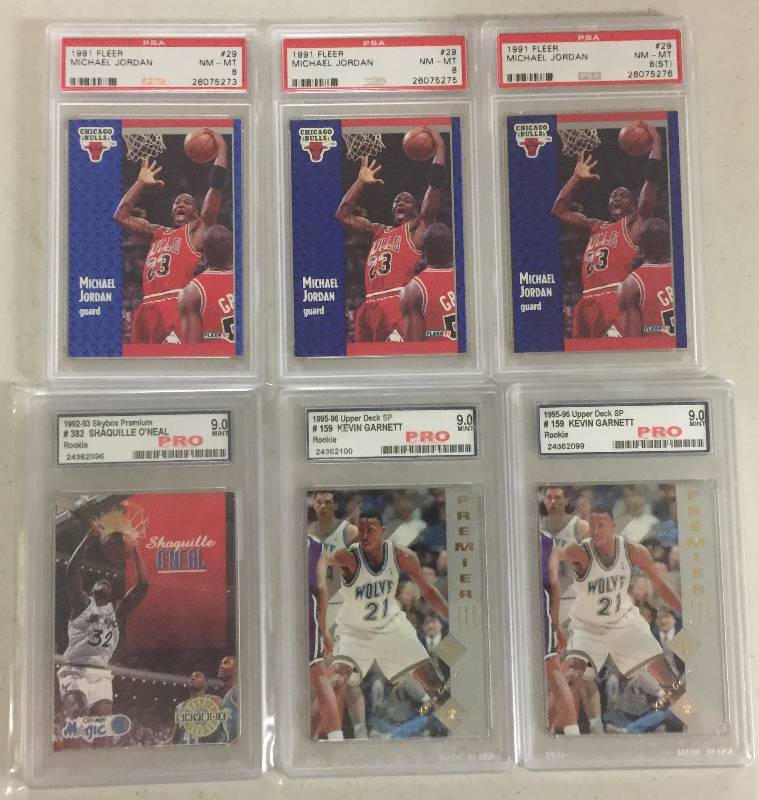 lot 1074 image: Six Professionally Grade Basketball Cards Including 3 Michael Jordan, 2 Kevin Garnett Rookies, and Shaquille ONeal Rookie