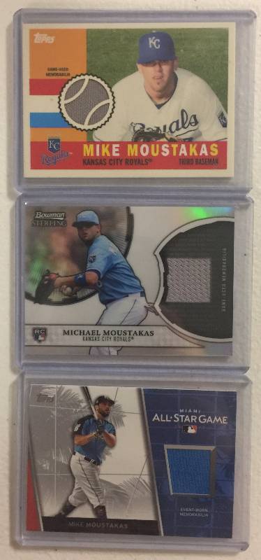 lot 1270 image: Three Mike Moustakas Kansas City Royals Game Used Jersey Relics Baseball Cards All One Money