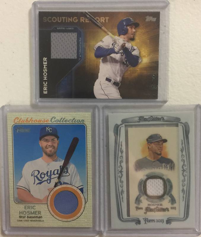 lot 1273 image: Three Eric Hosmer Topps Game Used Kansas City Royals Player Worn Relic Cards