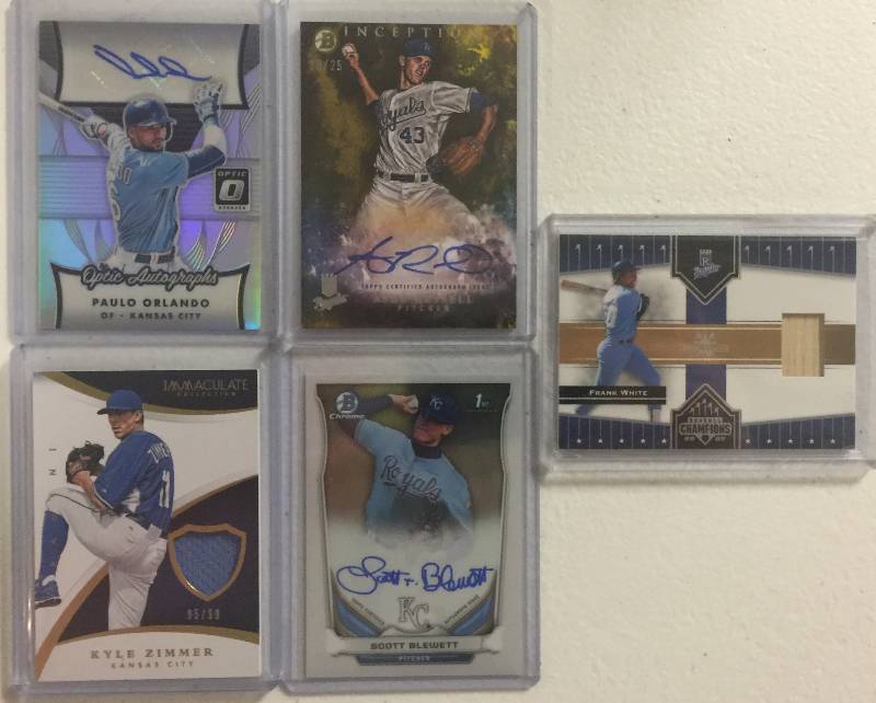 lot 1277 image: Five Kansas City Royals Autographs & Jersey Worn Relics Baseball Cards Including Frank White, Zimmer, Paulo Orlando, Scott Blewett, Russell