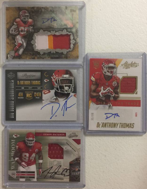 lot 1286 image: Four Kansas City Chiefs Rookie Autographed & Player Worn Relic Football Cards 100% Authentic  Less Than $3 a Card