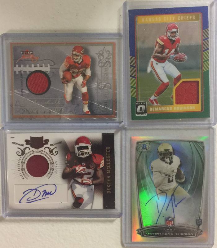 lot 1287 image: Four Kansas City Chiefs Rookie Autographed & Player Worn Relic Football Cards 100% Authentic  Less Than $3 a Card
