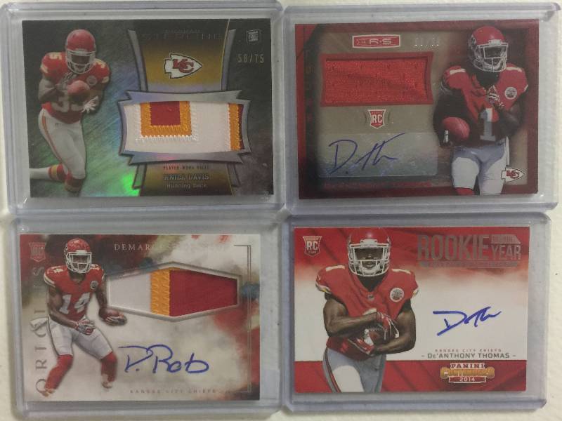 lot 1289 image: Four Kansas City Chiefs Rookie Autographed & Player Worn Relic Football Cards 100% Authentic  Less Than $3 a Card
