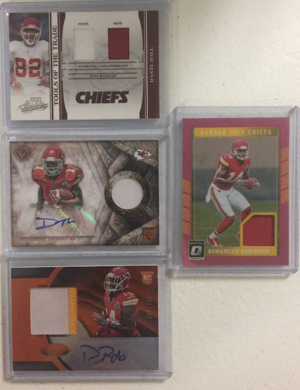 lot 1290 image: Four Kansas City Chiefs Rookie Autographed & Player Worn Relic Football Cards 100% Authentic  Less Than $3 a Card