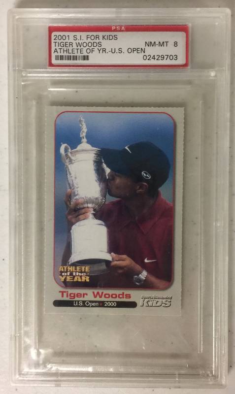 lot 1309 image: Near Mint - Mint 2001 Sports Illustrated For Kids Tiger Woods Rookie Card Professionally Graded PSA 8