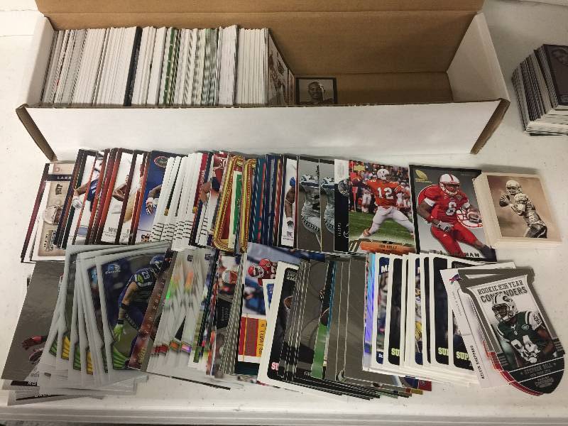 lot 1311 image: Packed Full 800 Count Box Full of Inserts, Rookies, Stars, and more Full of Football Cards - Only Newer Cards