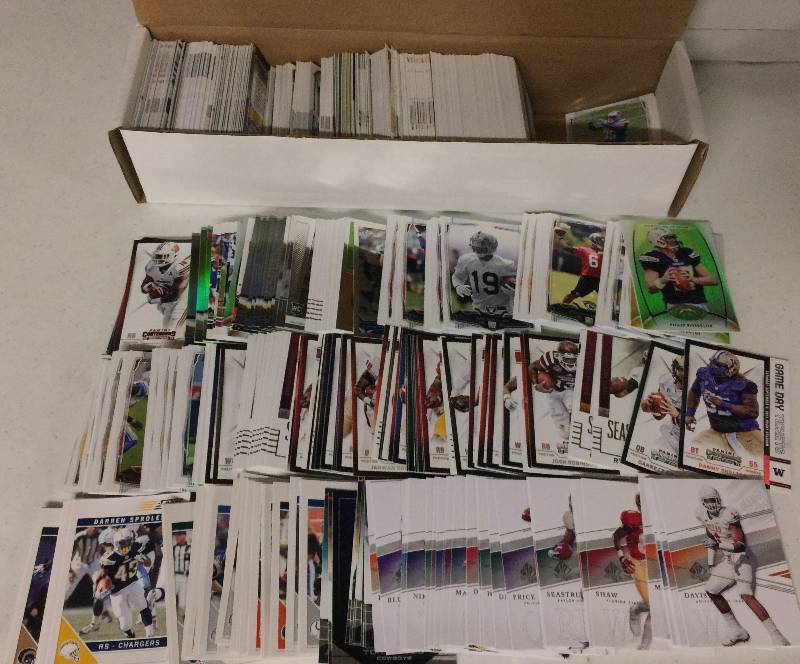 lot 1313 image: Packed Full 800 Count Box Full of Inserts, Rookies, Stars, and more Full of Football Cards - Only Newer Cards