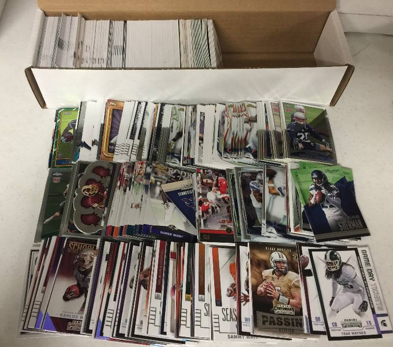 lot 1315 image: Packed Full 800 Count Box Full of Inserts, Rookies, Stars, and more Full of Football Cards - Only Newer Cards
