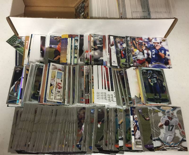 lot 1322 image: Packed Full 800 Count Box Full of Inserts, Rookies, Stars, and more Full of Football Cards - Only Newer Cards