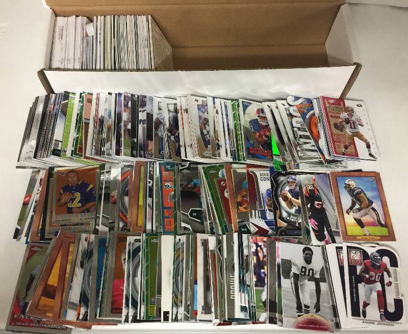 lot 1328 image: Packed Full 800 Count Box Full of Inserts, Rookies, Stars, and more Full of Football Cards - Only Newer Cards