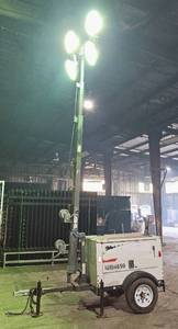 lot 48 image: Generac Magnum Power Model 3060M 30ft Mobile Light Tower & 6000w Generator - Diesel - Four 1000w Metal Halide Lights on 30-foot Steel Mast-7 Acres of Illumination w Adj 360-Degree Mast Rotation & 60 Hours Run Time. New Battery - Engine Tick. See Info