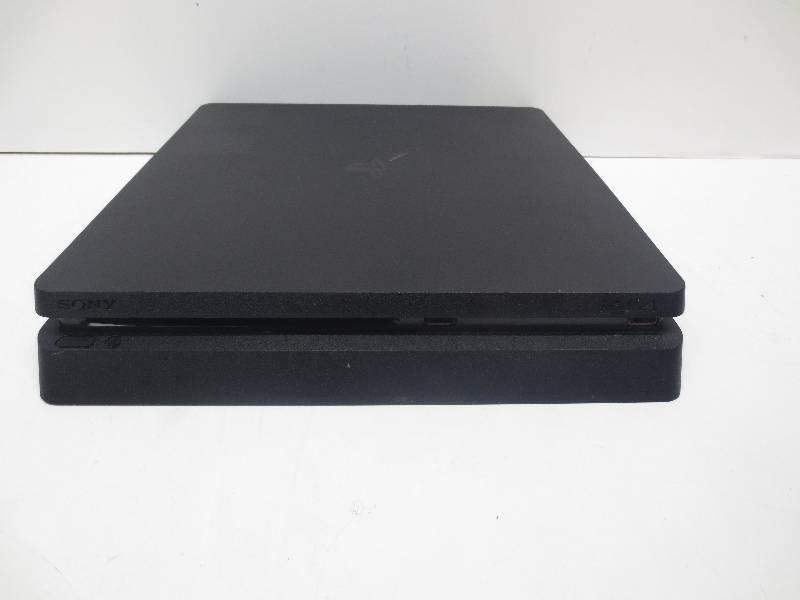 lot 3043 image: PS4 slim turns on, DVD drive does not work (cannot play disc games), but able to download and play games