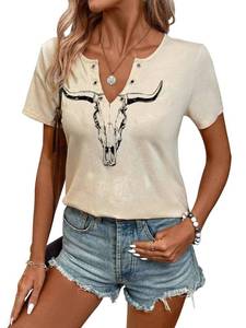 lot 12406 image: Womens Cow Skull Shirt Cowboy Country Concert Outfits Cute Western Graphic Tees Casual Summer Notched Neck Short Sleeve Tops (Apricot,S)