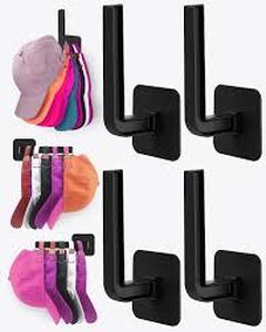 lot 2262 image: Black hat hangers or walls