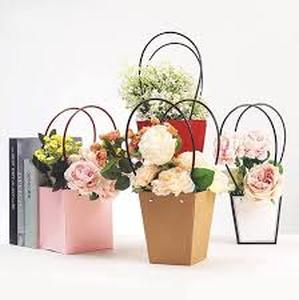 lot 2318 image: KUMGROT 10pcs Kraft Waterproof Fresh Flower Gift Bags Bouquet Handbag Trapezoid Kraft Flower Bouquet Wrapping Bag Christmas Bouquet Bag(Pink)