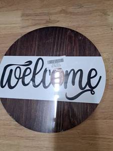 lot 2006 image: Welcome Sign on Wood Round