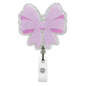 lot 2458 image: Glittery Bow Badge Reel, with Swivel Alligator Clip & Retractable Cord, for Women Nurses Teachers Doctors (Coquette Bow)