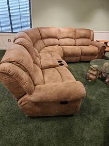 lot 1004 image: Man Wah Mfg Co. 6 pc  sectional with 2 rockerrecliners, center console with USB plug in 38 x 180 x  36 seat height 20 in located in basement