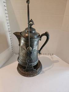 lot 1030 image: Antique silver-plated tilting water pitcher on a stand 21 x 11