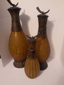 lot 1101 image: Home Decor.  Tallest is 23 inches. All have lids held by chain