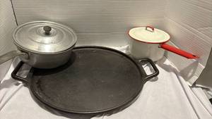 lot 1251 image: Cast Iron Skillet, egg poaching pan and small saucepan with lid