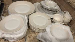 lot 1287 image: White Porcelain Dinnerware Set with Scalloped Edges by Hutschenreuther