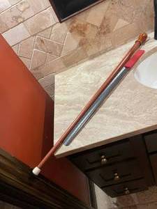 lot 1580 image: Long shoe horn and walking stick