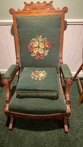 lot 2000 image: Antique wooden rocking chair and footstool with floral needlepoint cushions IN BASEMENT