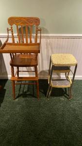 lot 2001 image: Antique wooden high chair and metal folding step stool IN BASEMENT