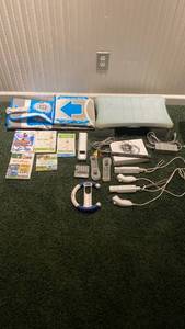 lot 2006 image: Wii entire set, console, games, balance board sensor bar and more IN BASEMENT