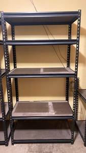 lot 2205 image: Heavy-duty black steel storage rack with 5 particle board shelves IN BASEMENT