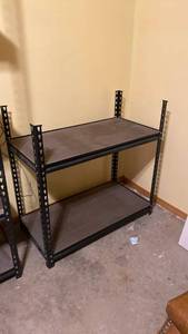lot 2206 image: Heavy-duty black steel storage rack with 2 particle board shelves IN BASEMENT