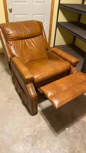 lot 2208 image: Brown vinyl recliner with nailhead trim IN BASEMENT