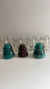lot 3035 image: Mason Jar lanterns and three Insulators