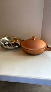 lot 3053 image: Two skillets - one new in wrapping and the other is an Our Place ceramic nonstick with lid