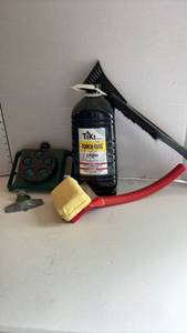 lot 3061 image: Torch fuel, sprinklers and ice scrapers
