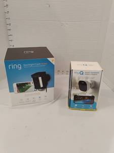 lot 3101 image: Ring Spotlight Cam Wired and MyQ Smart Outdoor Camera Bundle
