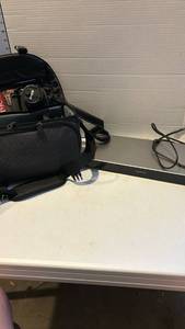 lot 3118 image: Panasonic DMP-BD Player with Nikon Camera in case