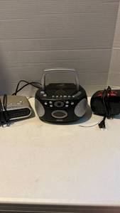 lot 3120 image: Two clock radios and a small boombox