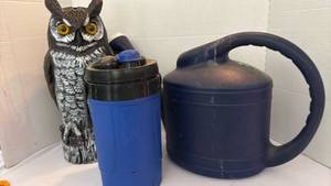 lot 3302 image: Decorative Great Horned Owl Garden Decoy with Yellow Eyes, IGLOO Water Jug and Water Pail