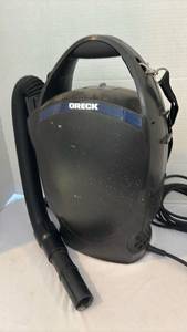 lot 3322 image: Oreck Canister Vacuum Cleaner with Shoulder Strap