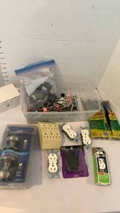 lot 3432 image: Door knobs, outlets and misc garage items