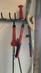 lot 3617 image: Rigid snake, saw and hedge clipper