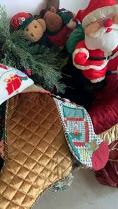 lot 3620 image: Christmas stockings, decor, garland and Christmas tree bag
