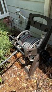 lot 4009 image: Garden Hose Reel with Hose