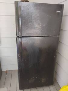 lot 4122 image: Frigidaire Refrigerator.  Used Outside.  Needs a touch up of paint.  Does NOT include contents.  66 x 31 x 34