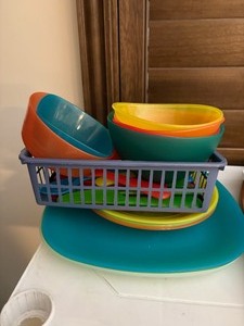 lot 1208 image: Plastic Dinnerware Set with Plates and Utensils