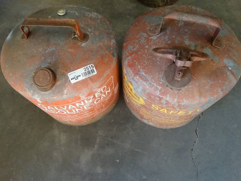 lot 2515 image: 2 old metal gas cans, one is a safety can.