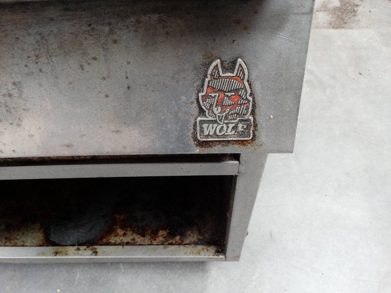 lot 2543 image: Wolf natural gas grill.