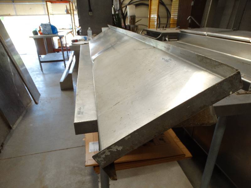 lot 2544 image: Stainless steel shelf 7W x 12D.